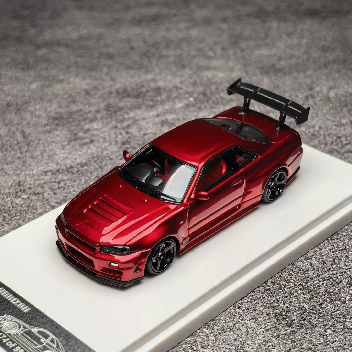 Nissan Skyline GT-R R34 Red Metallic with Rear Wing 1:64 Scale Diecast Model