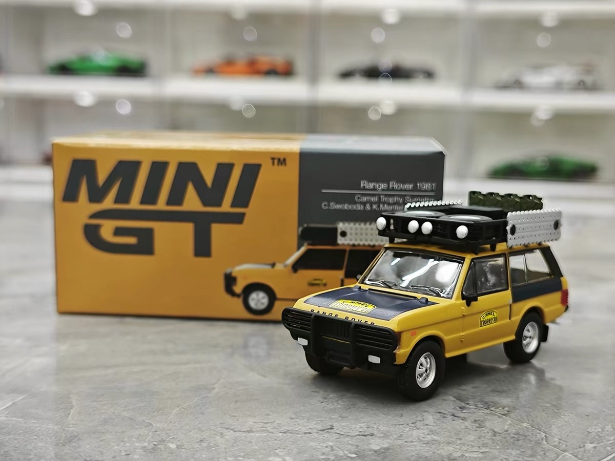 MINI GT 1:64 Range Rover Camel Trophy Rally Supplier with Roof Rack